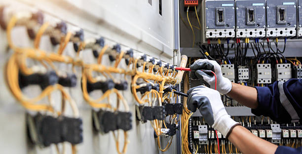 Professional Electrician technician working in Kalona, IA